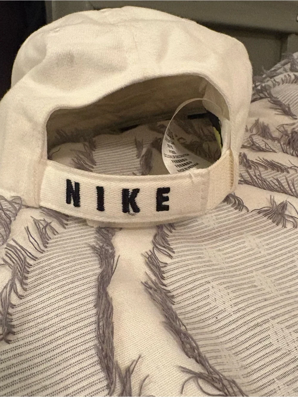 Nike Kids White Hat with Black Swoosh and Yellow Flower